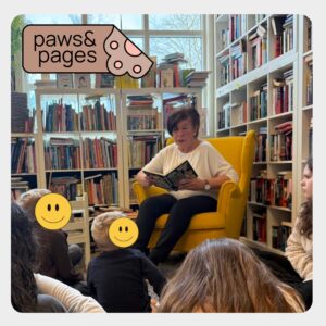 Children seated together listening during a shared reading session